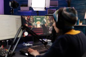 woman-live-streaming-video-games-on-monitor-with-c