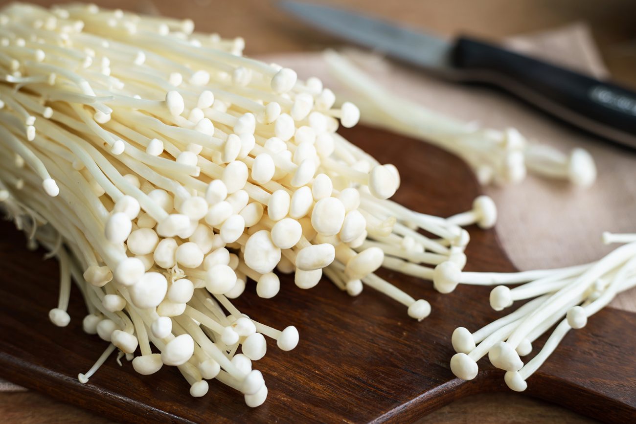 enoki-mushroom-on-old-wooden-table